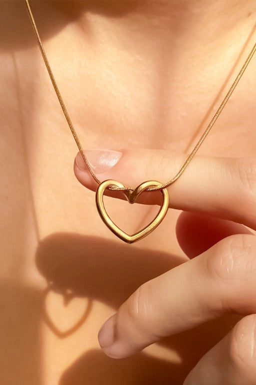 Dainty gold heart necklace made of stainless steel, perfect for a stacked jewelry look.