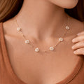 18K gold plated stainless steel necklace featuring flower-shaped beads by Kogi Jewelry.