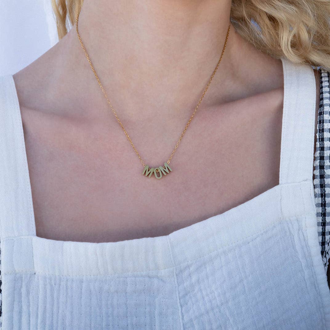 Woman wearing a delicate Gold Mom Necklace
