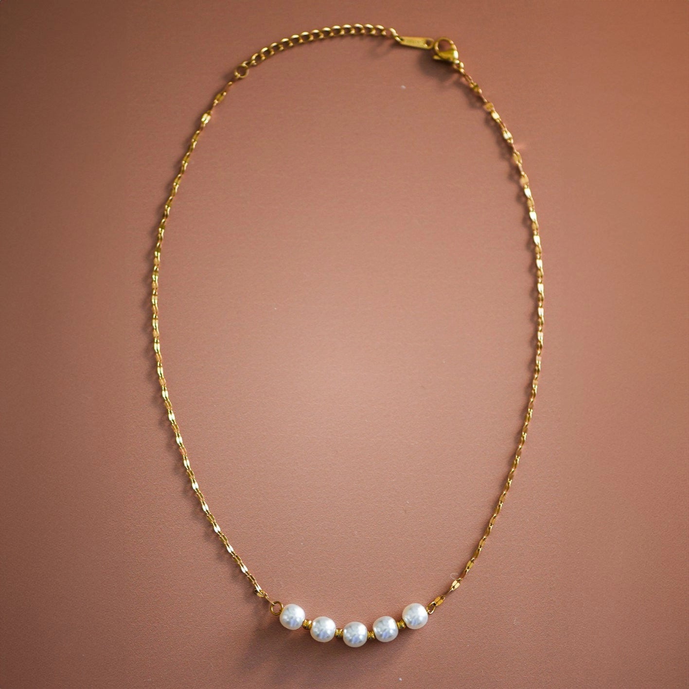 18K gold plated stainless steel station necklace with delicate pearls by Kogi Jewelry.