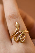 18K gold plated stainless steel snake wrap adjustable ring worn on finger by Kogi Jewelry.