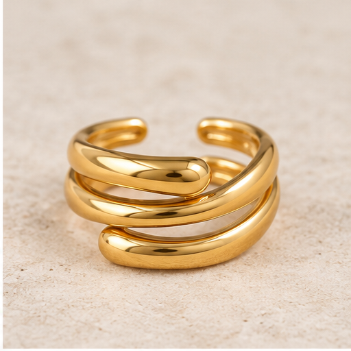 Gold triple band statement ring with modern sculptural design