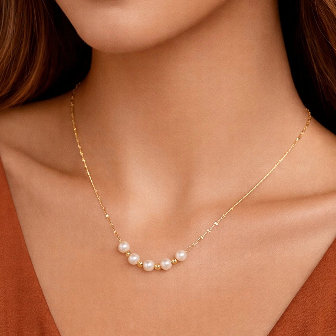 18K gold plated stainless steel station necklace with delicate pearls by Kogi Jewelry.