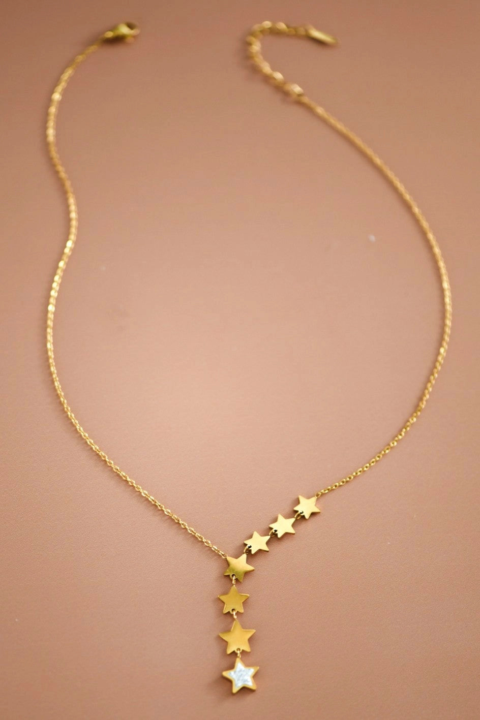 18K gold plated stainless steel lariat chain necklace with star charms.